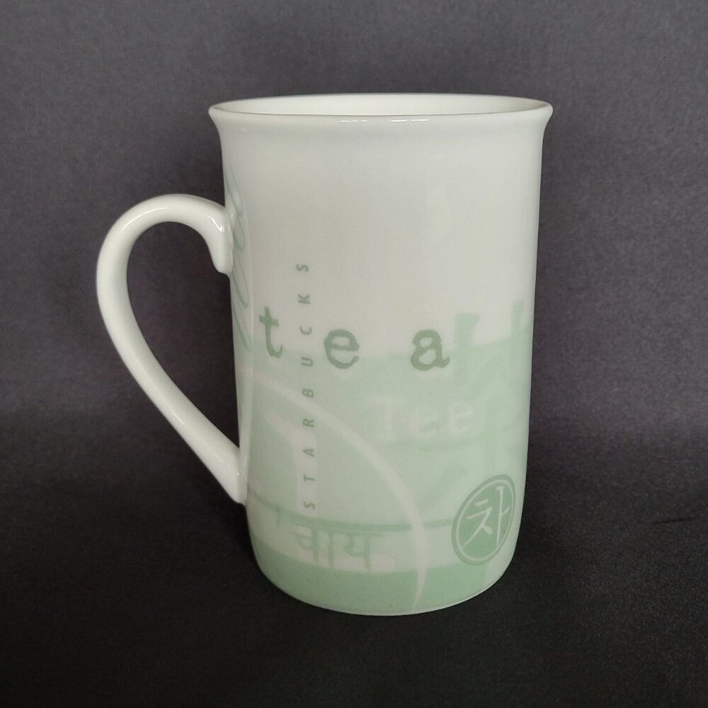 Starbucks 1998 Coffee Tea Cup Mug Green & White‎ 10 oz Multi Language Collector